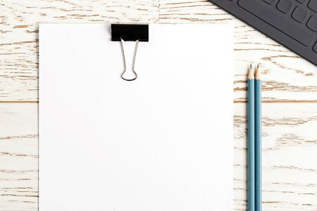 Creative person modern home office desk with paper sheets and pencils for drawing and notebook. Plants for comfort. Template of the desk with copy space for your textの写真素材