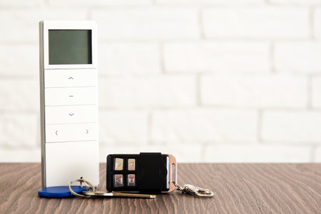 Remote key with buttons and wireless control with display for house access. Smart home devices and securityの写真素材