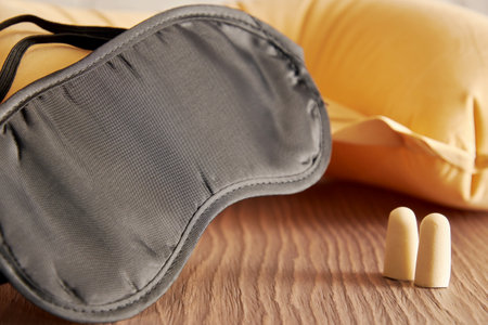 Sleeping accessories, mask, earplugs, pillow for travels and airplane. Sleep care and symbolsの写真素材