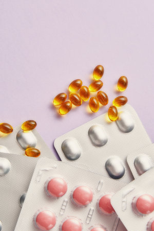 Banner with pharmaceutical pills packages. Vitamins, painkillers, antibiotics packages. Copy space for text. Vertical templateの写真素材