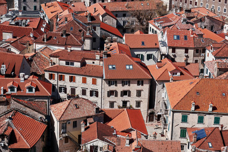 Medieval european city aerial view with orange tiled roofs. Old city of Kotor, Montenegro....