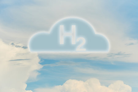 Blue Hydrogen H2 cloud icon drawn high up in the sky on the clouds. Modern renewable green fuel....