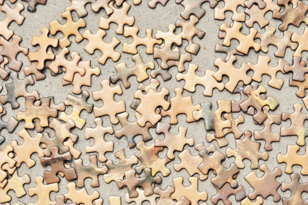 Scattered puzzle pieces, suggesting the concept of incompleteness. Need to find the missing piecesの写真素材