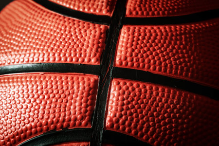 Closeup macro pinky texture of leather basketball. Streetball and hoops. Professional sports backgroundsの写真素材