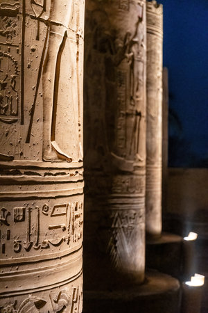 Detailed view of ancient columns adorned with hieroglyphics and carvings at the Kom Ombo Temple in...