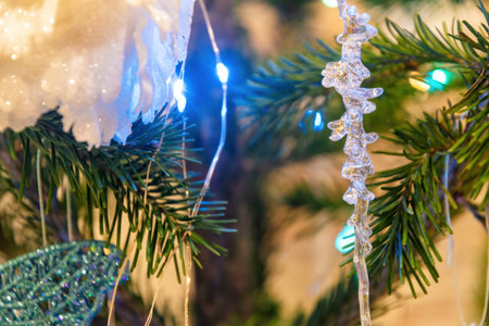 Christmas tree adorned with various ornaments and lights, capturing the festive spirit of the holiday seasonの写真素材