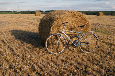 bike on a straw landscapeの写真素材