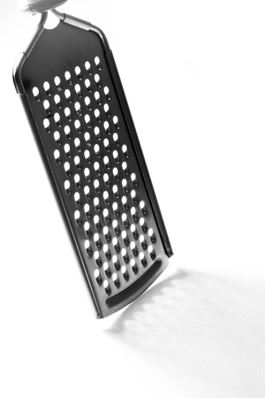 Manual grater on a white backgroundの写真素材