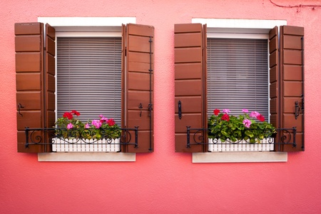 Window one of the colored houses in Burano, Venice, Italyの写真素材