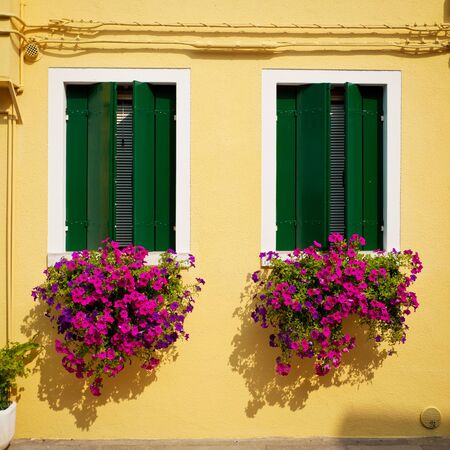 Window one of the colored houses in Burano, Venice, Italyの写真素材