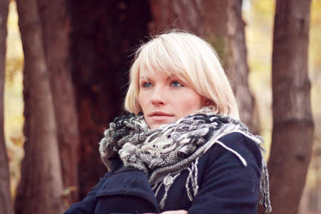 Portrait of a girl in the autumn parkの写真素材