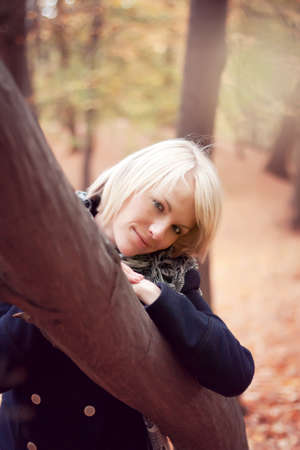 Portrait of a girl in the autumn parkの写真素材
