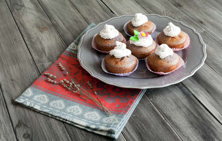 Blueberry cupcakes with butter cream. Homemade cakes.の写真素材