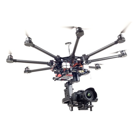 Copter closeup isolated on a white background. The aircraft with a raised chassis. Copter with a...