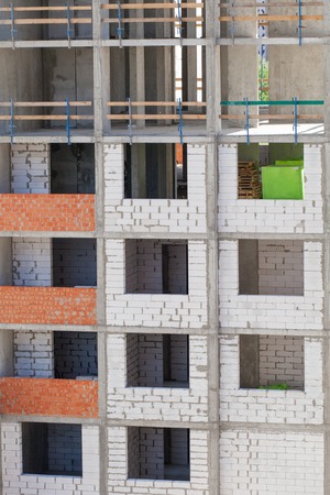 Monolithic frame construction of the building. Solid walls of concrete. Formwork for walls made of concrete. Construction of the building. Masonry walls and aerated concrete masonry wallsの写真素材