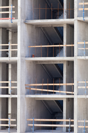 Monolithic frame construction of the building. Solid walls of concrete. Formwork for walls made of...