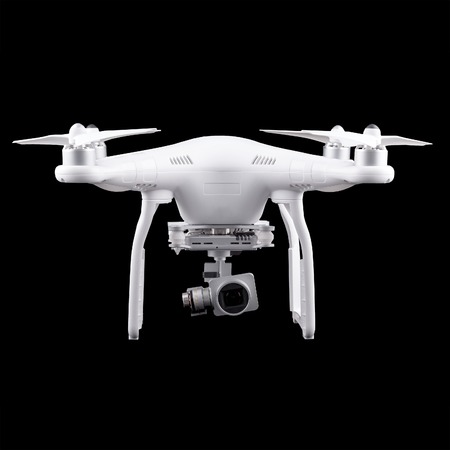 Unmanned aerial vehicle, drone on isolated background, quadrocopter designed for photo and video shooting. White quadrocopter camera.の写真素材