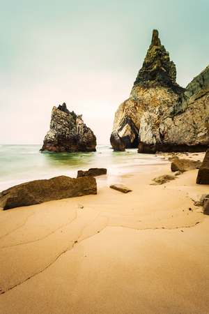 Isolated beach Ursa on Atlantic coast near the Cape Roca, Sintra, Portugalの写真素材