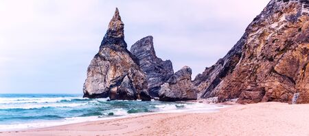 Panorama of isolated beach Ursa on Atlantic coast near the Cape Roca, Sintra, Portugalの写真素材