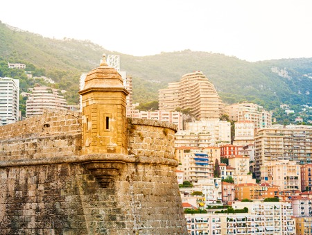 Detail of Prince's Palace in Monaco-ville and the city in the background in the evening, Monacoの写真素材