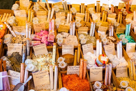 NICE, FRANCE - AUGUST 28, 2016: Counter in the market with flavored salt in Nice, France. Many...