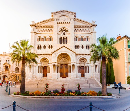 Exterior of the Monaco Cathedral in Monaco-Ville. Beautiful bright church in the last rays of the sun. Cathedrale de Monaco.の写真素材