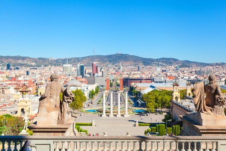 Square of Spain in Barcelona with two Venetian towers in red brick and columns in the foreground, Plaza de Espana. Spain.の写真素材