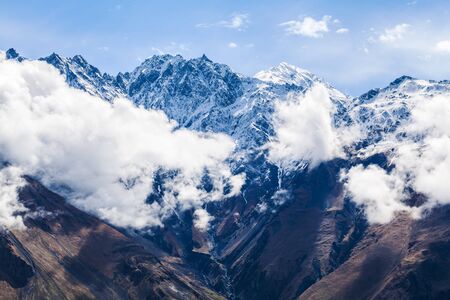 Mountain landscape near the village Stepantsminda Georgia in the early morning with fog.の写真素材