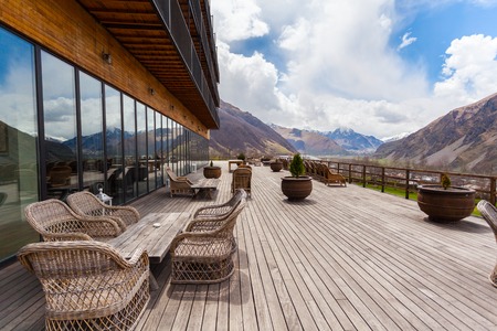 Modern building with panoramic views of Mount Kazbegi and Gergeti Trinity Churchのeditorial素材