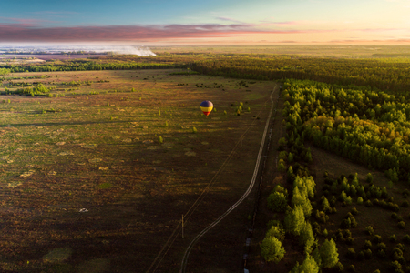 Balloon against the backdrop of nature at sunset.の写真素材
