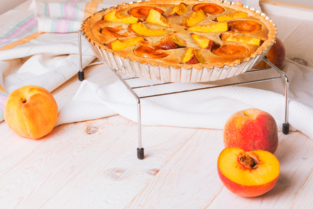 Peach pie in almond creamの写真素材