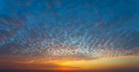 Sunset sky with voluminous clouds