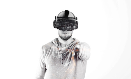 Man using virtual reality headset at whiteの写真素材