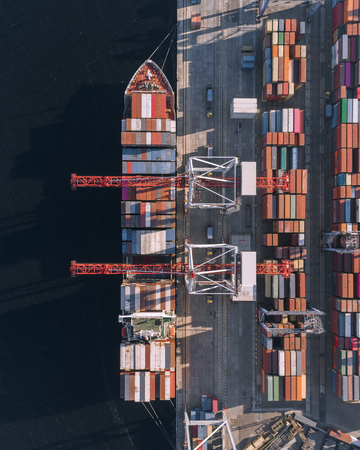 Container cargo ship in import export business logistic, Freight transportation, Aerial view.の写真素材