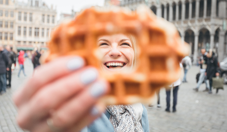 Female tourist at the Grand Place in Brussels, Belgiumの写真素材