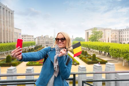 Woman traveler looks at the sights of Brussels, Belgium.の写真素材