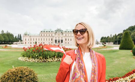 Female traveler on the background of Belvedere Palace complex of the 18th century in Vienna, Austria.のeditorial素材