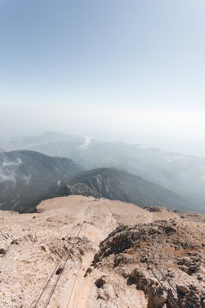 Panoramic view of Taurus Mountains with Olympos Teleferik cable cars in Kemer, Turkey