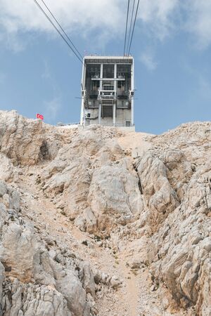 View of the upper station of the cableway to the Tahtali mountain in Kemer from the cab that goes down, Turkeyの写真素材