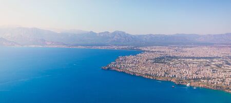 Aerial view of the Mediterranean Sea and the coast of Antalya and the city itself from the sea, Turkeyの写真素材