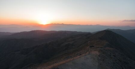Beautiful mountain landscape with sunset over Taurus Mountains from the top of Tahtali Mountain near...