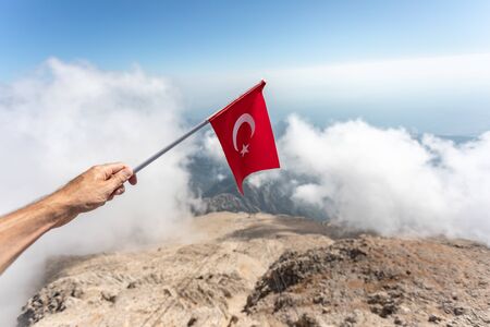 Flag of Turkey against the backdrop of Taurus Mountainsの写真素材