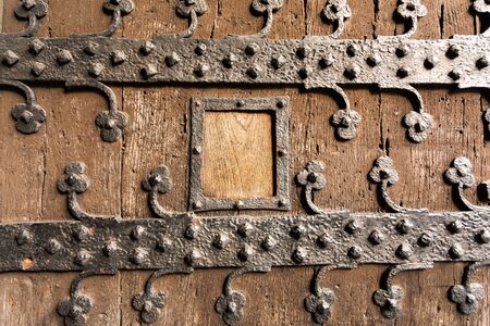 Vintage wooden gate with a windowの写真素材
