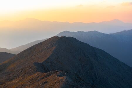 Panorama of the mountains at sunset.の写真素材