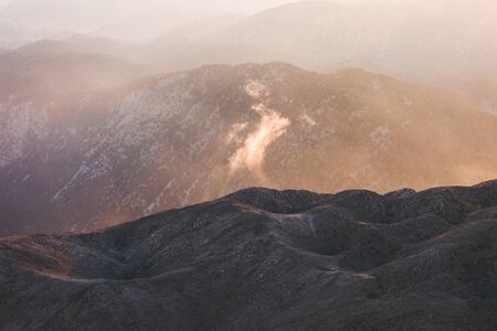 Panorama of the mountains at sunset.の写真素材