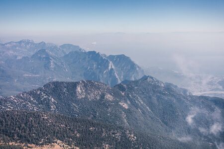 Panoramic view of the mountain landscape. Mountain silhouettes. View from Mount Tahtali near Kemer to Taurus Mountains, Turkeyの写真素材