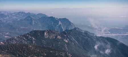 Panoramic view of the mountain landscape. Mountain silhouettes. View from Mount Tahtali near Kemer to Taurus Mountains, Turkeyの写真素材