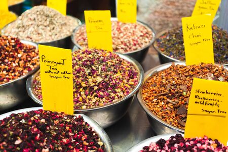 Background from Various fruit teas on a counter at the Mahan Yehuda Market in Jerusalem, Israel. Oriental teasの写真素材