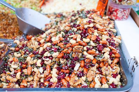 Mix of nuts with sesame seeds, seeds and dried cranberriesの写真素材