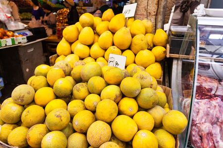 Yellow Melon Counter at the Mahane Yehuda market in Jerusalem, Israelの写真素材